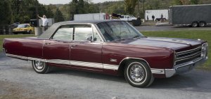 1968_Plymouth_VIP_4-door_sedan_front_right_Hershey_2019.jpg