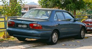 1996_Proton_Wira_4-door_sedan_19318308014.jpg