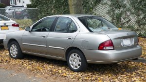 2002_Nissan_Sentra_GXE_in_Radium_Metallic_rear_left.jpg
