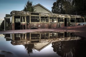 1MDGourleyOLDABANDONEDBUSWATERPUDDLEREFLECTIONCanonG7X.jpg