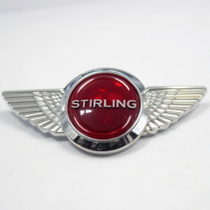chrome-badge-with-wings-either-side-of-a-central-c1.png