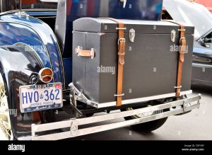 vintage-car-with-a-travel-trunk-CRF1BP.jpg