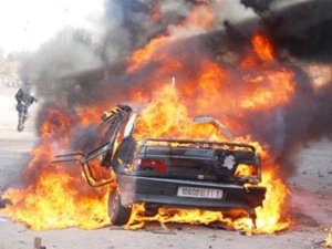 a-burning-car-during-a-demonstration-in-marrakech.jpg