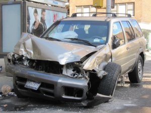 wrecked-tk-parked-at-the-side-of-the-street-in-new-york-city_100417134_l.jpg