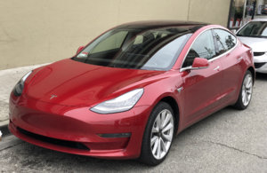 Tesla_Model_3_parked_front_driver_side.jpg