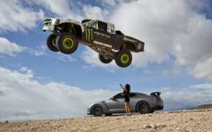 Monster-truck-jumping-over-Godzilla-2.jpg
