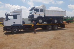 man-truck-roll-back-man-tag-axle-14-ton-rollback-id-61824304-type-main.jpg