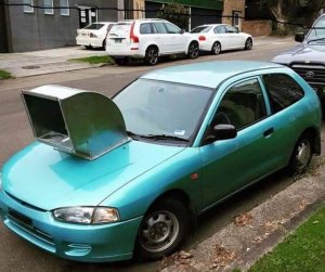 ugly-car-mod-exhaust-vent-from-hood.jpg