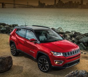 2020-jeep-compass-hero-mobile-red-parked-beach_8a7a96c698c6a4262ddeb44a2ecaf6a0-1242x1085.jpg
