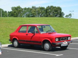 1200px-Zastava_Yugo_311_1116cc.jpg