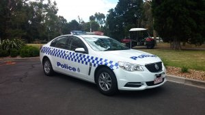 2014_Holden_Commodore_VF_MY14_Evoke_sedan_Victoria_Police_2015-01-02.jpg