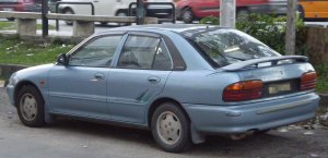 1280px-Proton_Wira_Aeroback_first_generation_rear_Cheras.jpg
