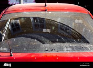 dirty-hatchback-car-rear-window-close-up-wiped-by-car-wiper-rear-view-glass-2C5NN18.jpg